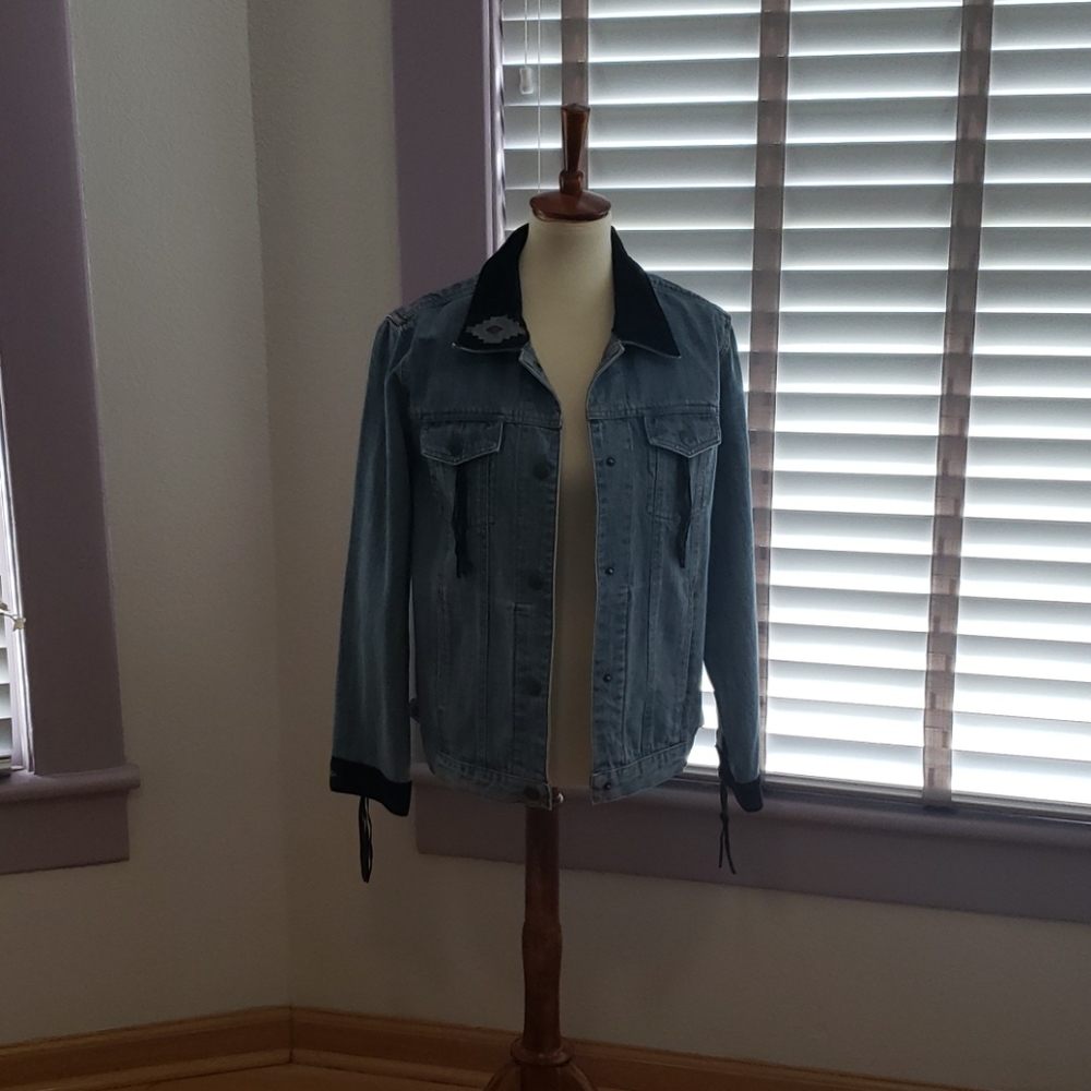 Jean jacket with black fringe